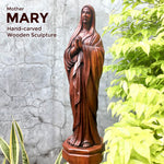 Hand-carved out of solid hardwood this sculpture is quite unique and rare. The image depicts the Virgin Mary with beautiful detail. A stunning Masterpiece. Bring home the blessings of Jesus and Mary. Easternada