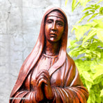 Hand-carved out of solid hardwood this sculpture is quite unique and rare. The image depicts the Virgin Mary with beautiful detail. A stunning Masterpiece. Bring home the blessings of Jesus and Mary. Gospel Christian Prayer. Bible. Easternada